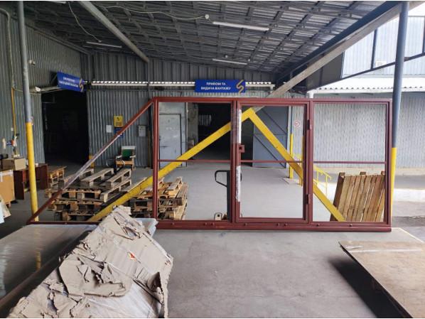 Відкатні ворота "Звари Сам" на проєм 5 метрів, довжина воріт 7 метрів з хвірткою, із зашивкою "Профнастил" – фото